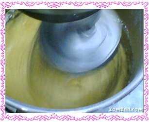 Sift flour, baking powder, salt, milk powder together in a bowl beat eggs, add sugar and SP
